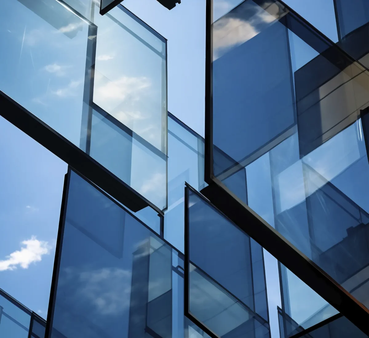 Glass panels reflecting the sky