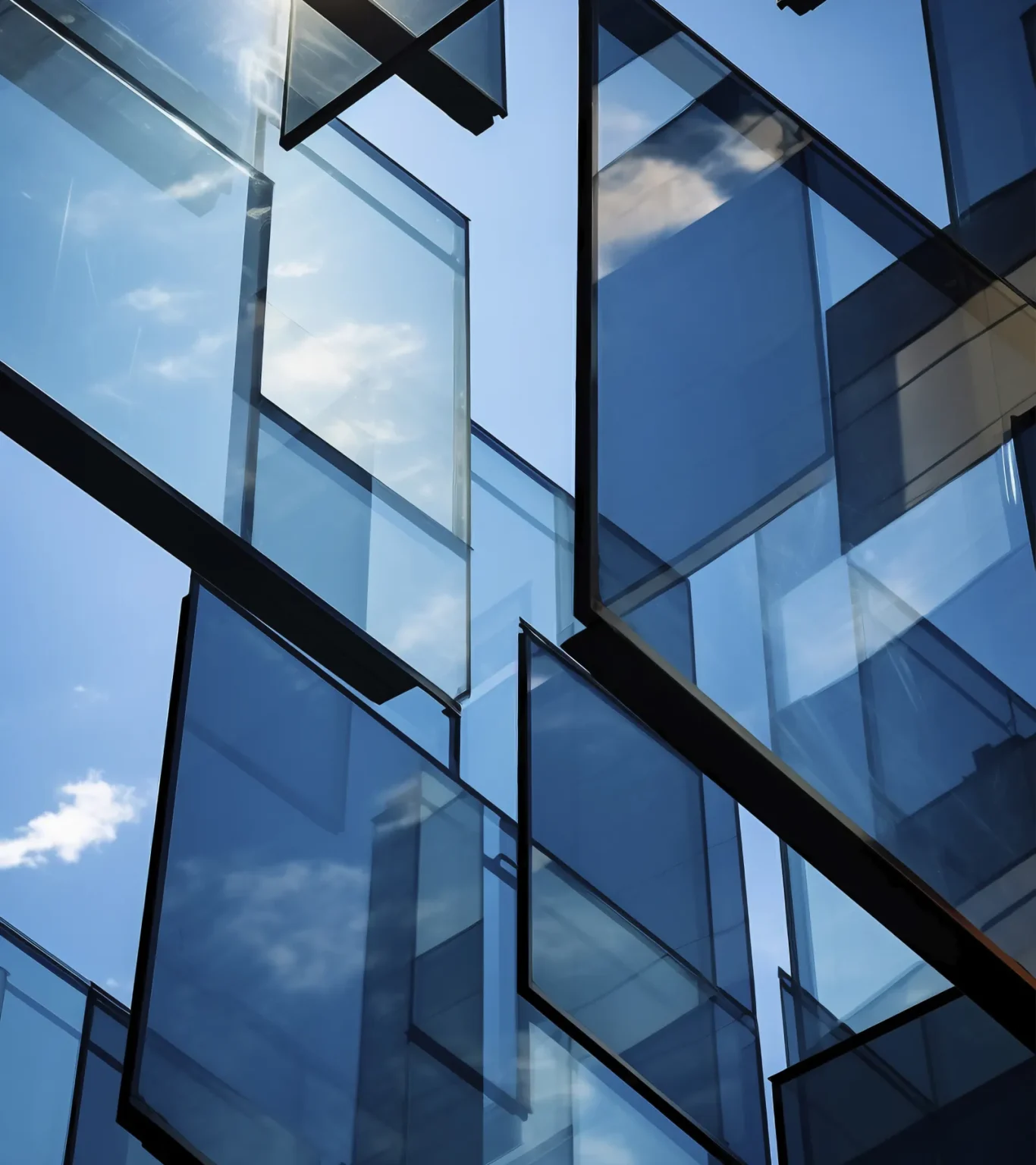 Glass panels reflecting the sky